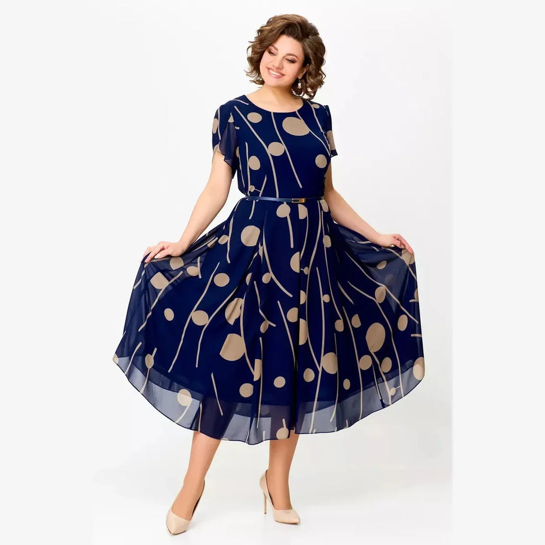 Elegant women's navy polka dot midi dress. Chic, flowy design perfect for spring, summer, or special occasions.