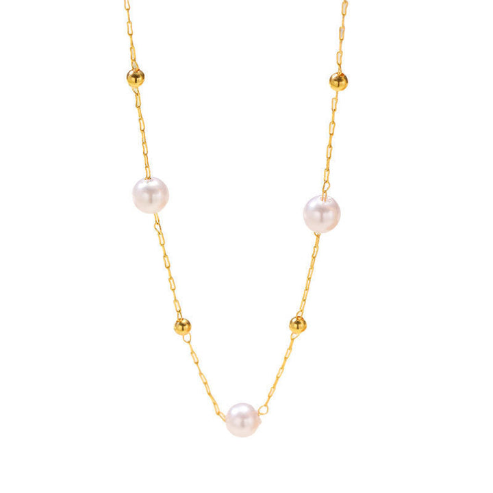 Fashionable women's gold chain necklace featuring classic imitation pearls, a versatile and elegant accessory.