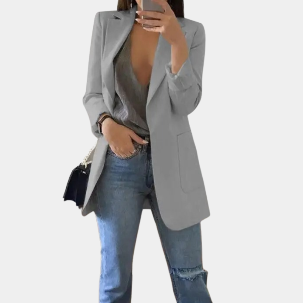 Stylish women's single-breasted notch lapel blazer jacket. Hip-length design for a modern professional look.