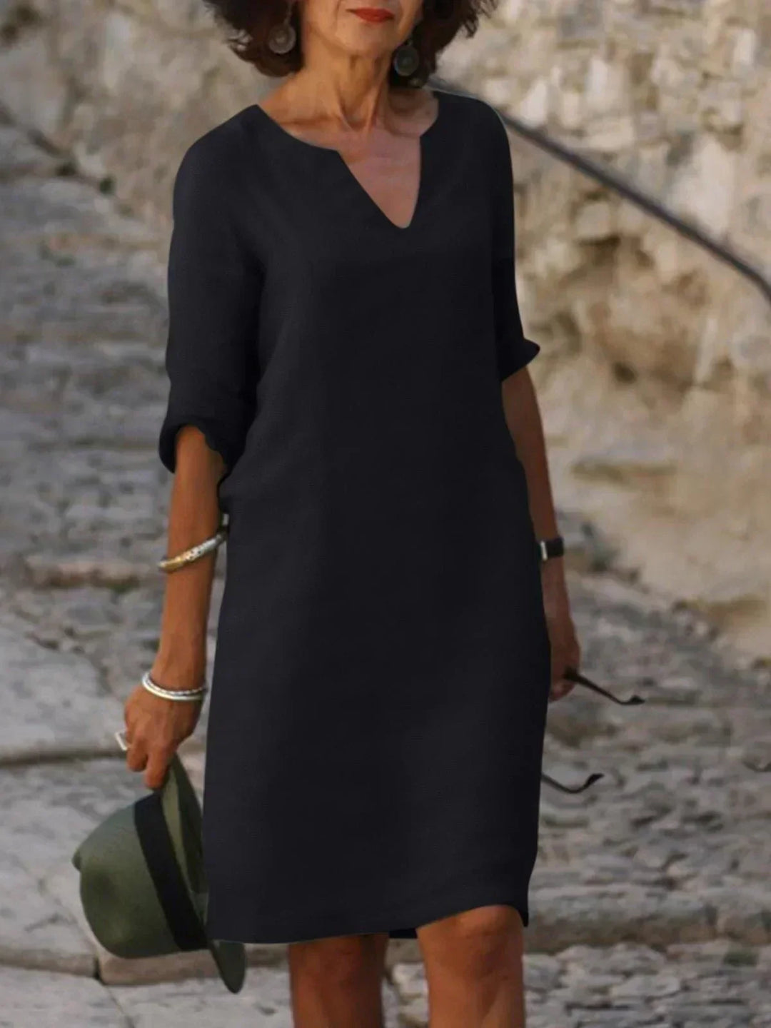 Elegant women's notch neck midi dress, perfect for versatile daytime wear and sophisticated style.