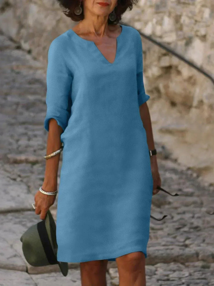 Sophisticated women's notch neck midi dress, a flattering fit for versatile and comfortable fashion.
