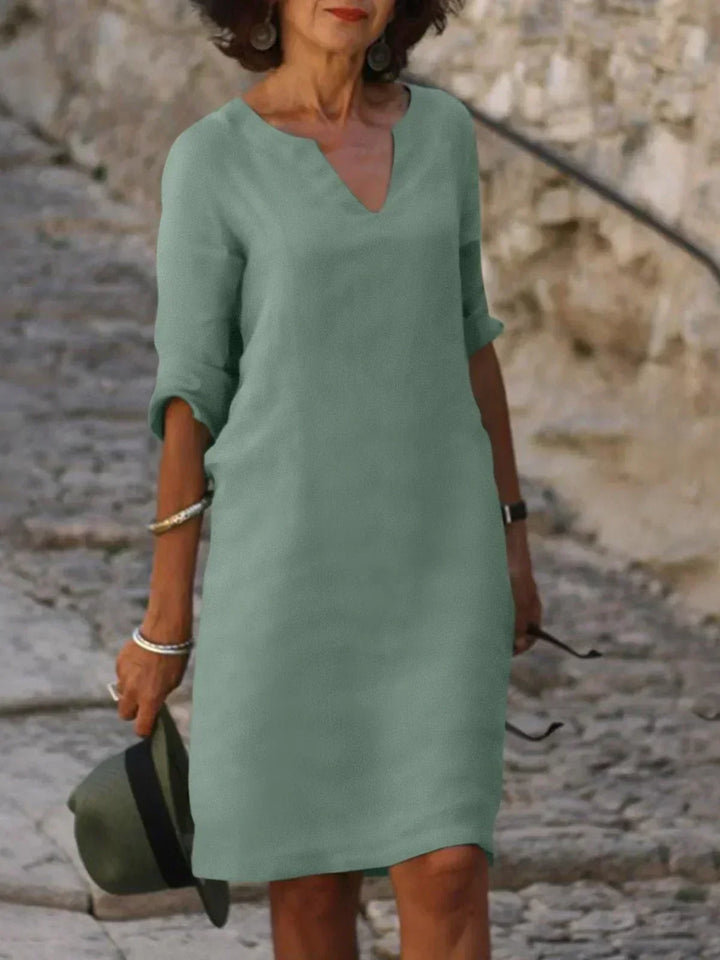 Versatile women's elegant midi dress with a stylish notch neck, great for summer and casual wear.