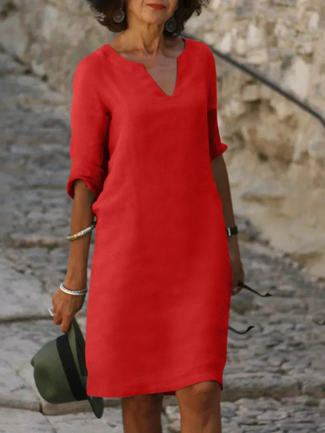 Stylish women's midi dress featuring a unique notch neck, perfect for sophisticated summer fashion.