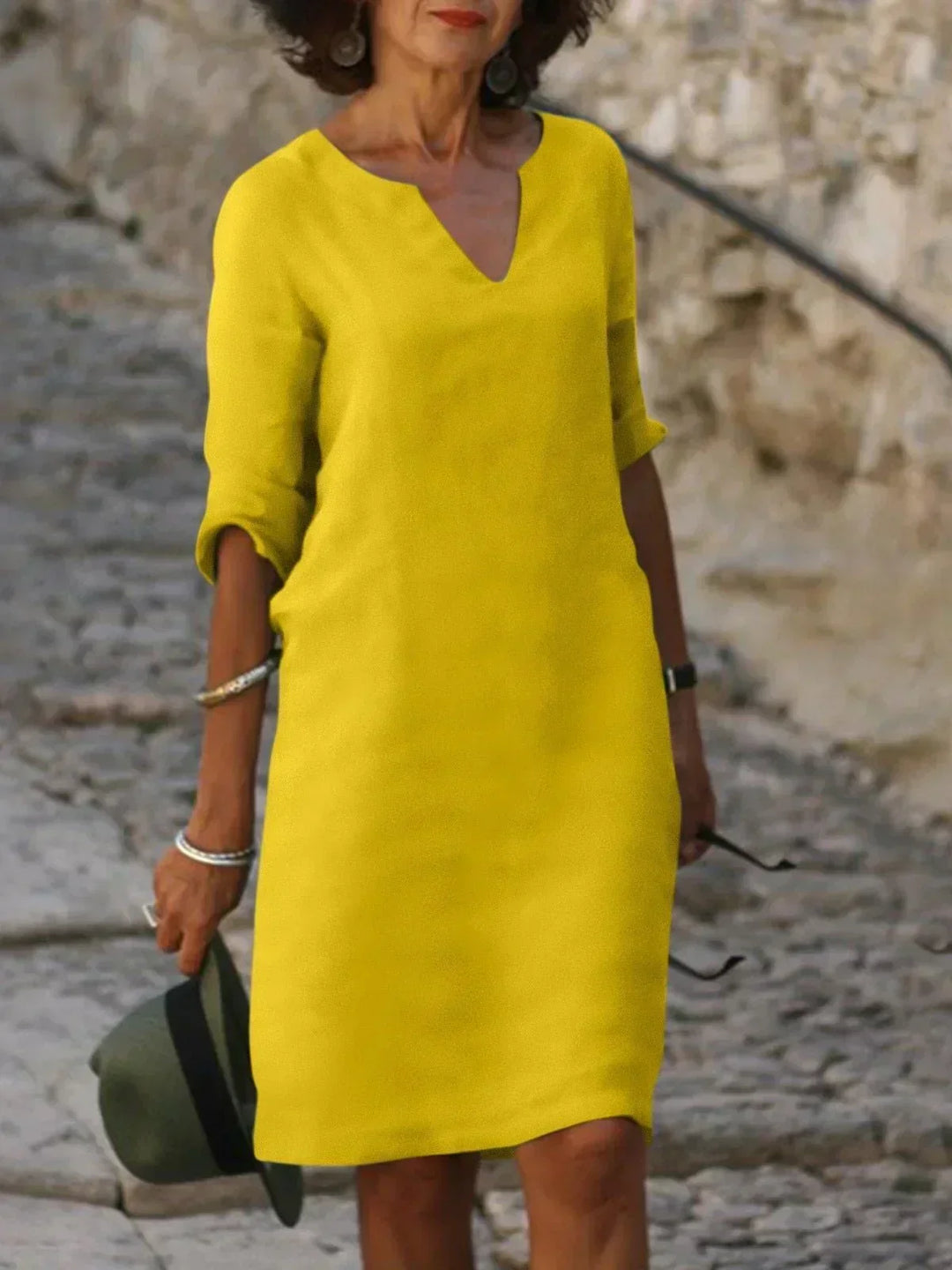 Women's versatile notch neck midi dress, a flattering choice for both casual and dressy occasions.