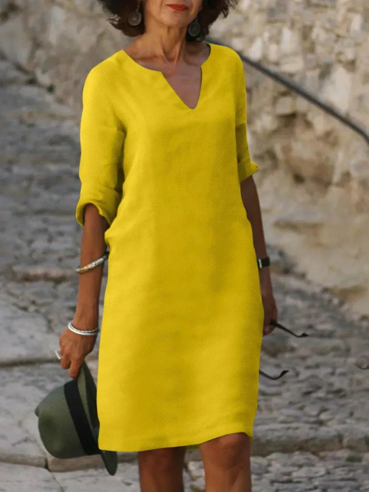 Women's versatile notch neck midi dress, a flattering choice for both casual and dressy occasions.