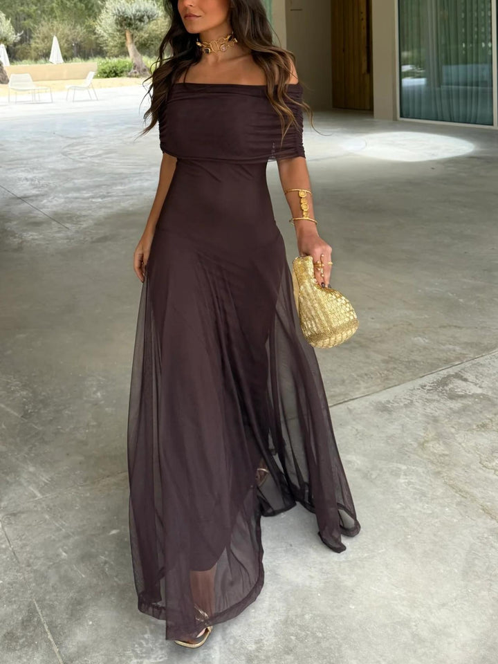 Romantic off-shoulder long maxi dress for women, ideal as a formal evening or wedding guest outfit.