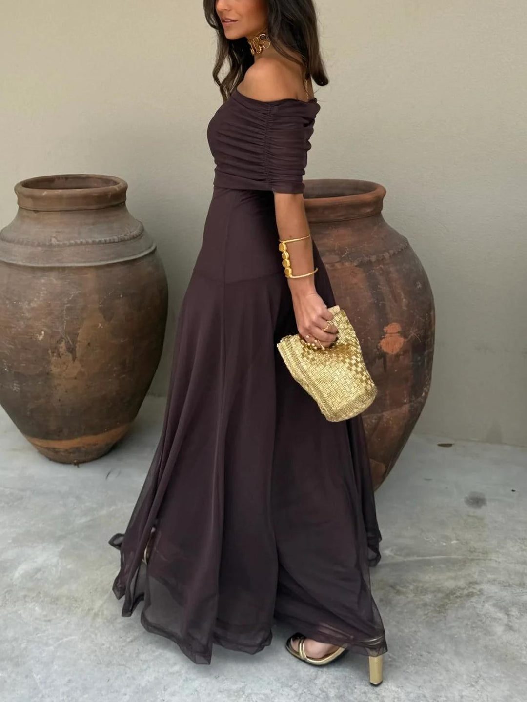 Chic women's off-shoulder evening gown. Long brown maxi dress for elegant garden parties & events.