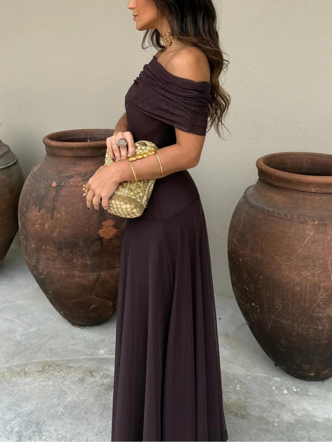 Beautiful brown off-shoulder maxi dress for women, a stylish choice for garden parties or a wedding guest.