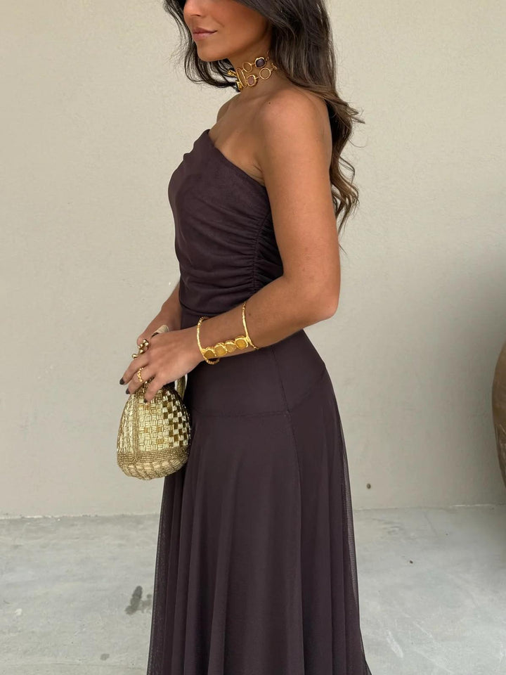 Sophisticated off-shoulder long maxi dress for women. Ideal formal evening wear for garden parties & special events.