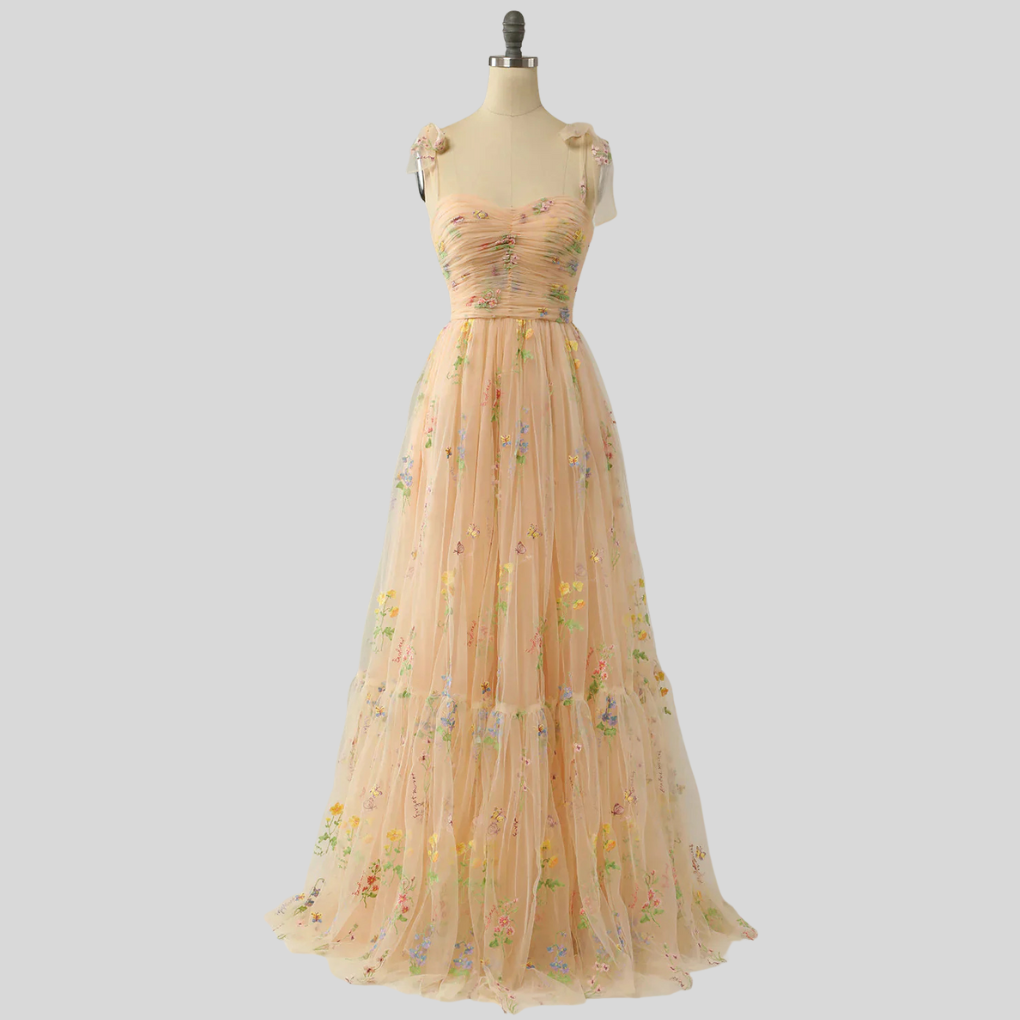 Embroidered tulle ball gown for women, a sophisticated off-shoulder evening and formal wear.