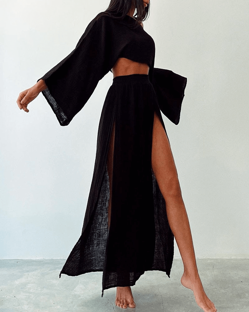 Versatile women's high waist maxi skirt with side slit, part of an elegant two-piece set with off-shoulder top.