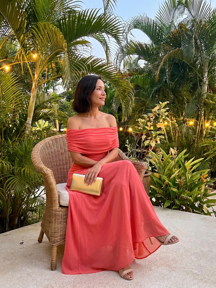 A stunning off-shoulder midi dress for women, featuring a flattering draped fit for formal wear.