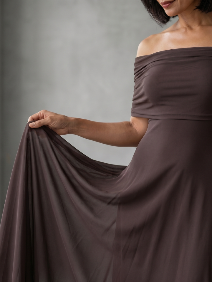 Women's formal off-shoulder midi dress with graceful draping, ideal for elegant evenings & events.