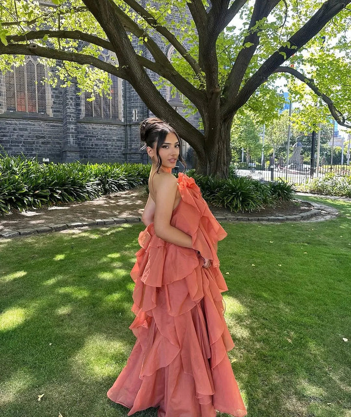 Stylish off-shoulder ruffled maxi dress for women, ideal for a wedding guest outfit or elegant evening party.