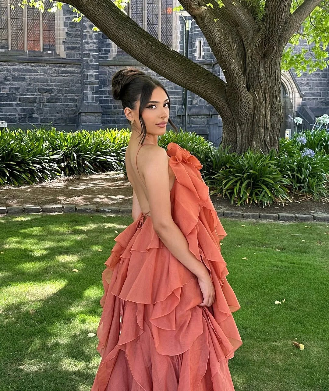Beautiful women's off-shoulder maxi dress with ruffles, a chic choice for a wedding guest or special occasion.