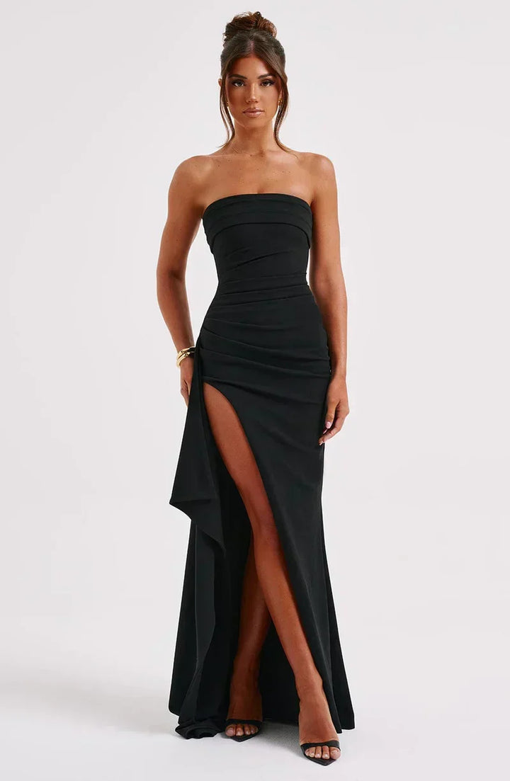 Black women's off-shoulder twisted maxi dress, a chic and timeless formal gown for elegant evening events.