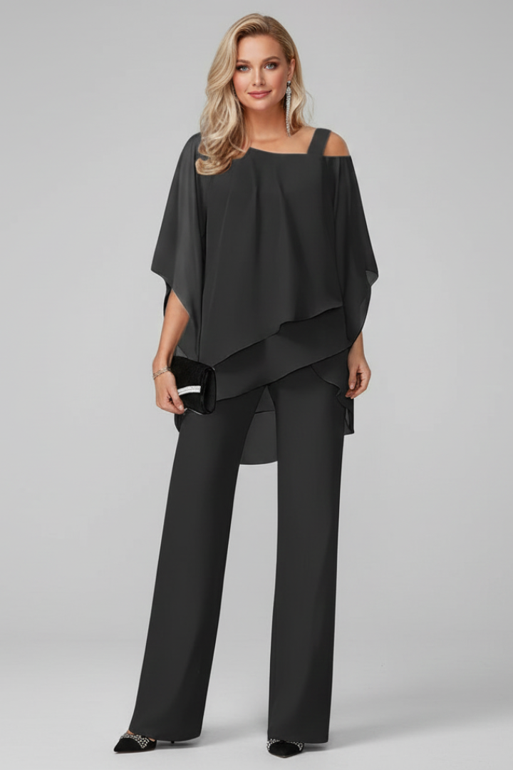 Flowing black off-shoulder wide-leg jumpsuit for women, offering comfortable and stylish summer fashion.