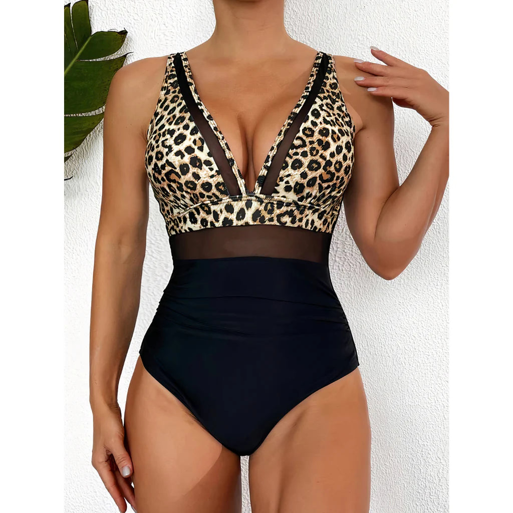 Black women's one-piece swimsuit, providing a flattering and comfortable fit for swimwear & beach activities.