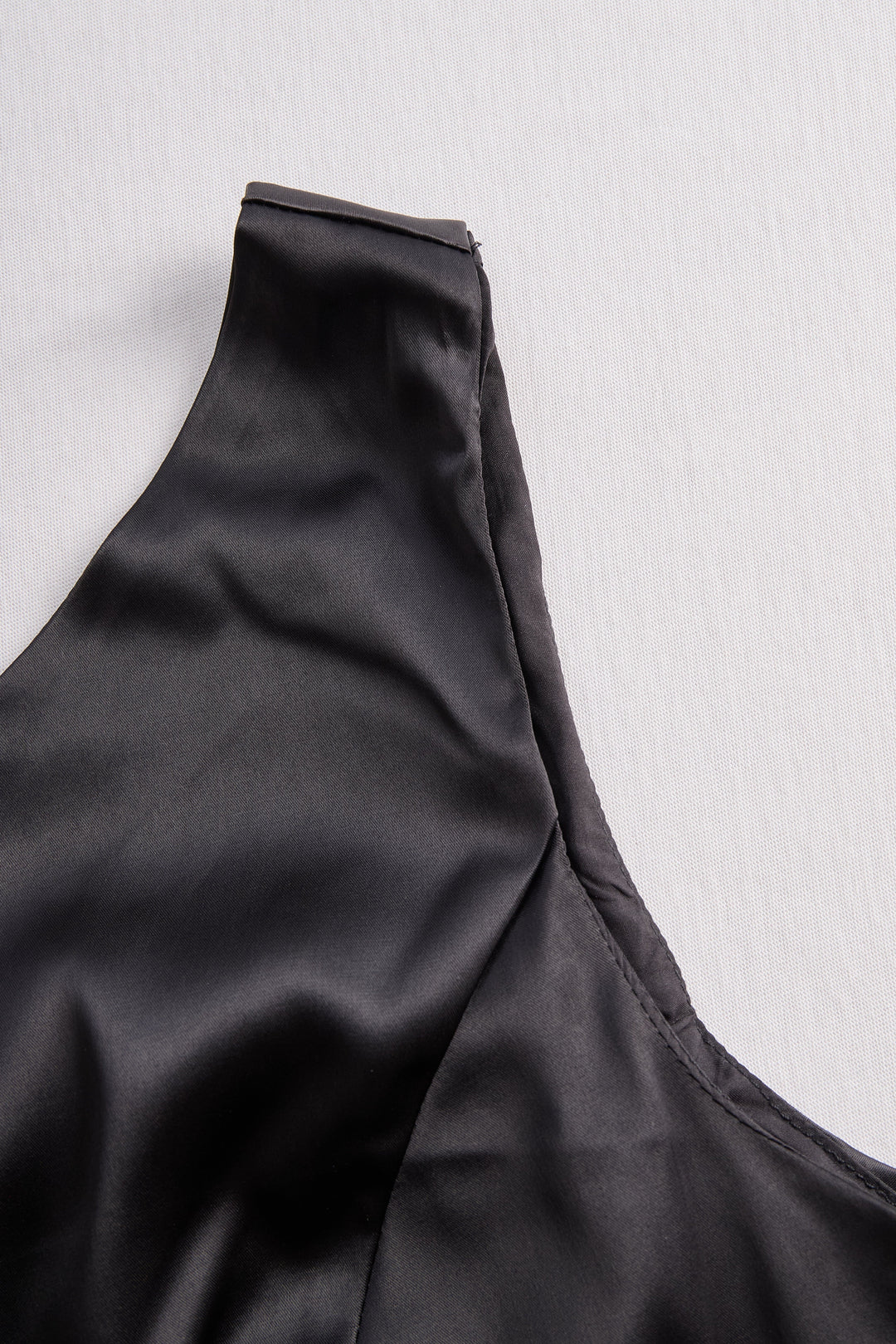 Flowing black one-shoulder maxi dress, an elegant women's gown for evening events, parties & formal occasions.