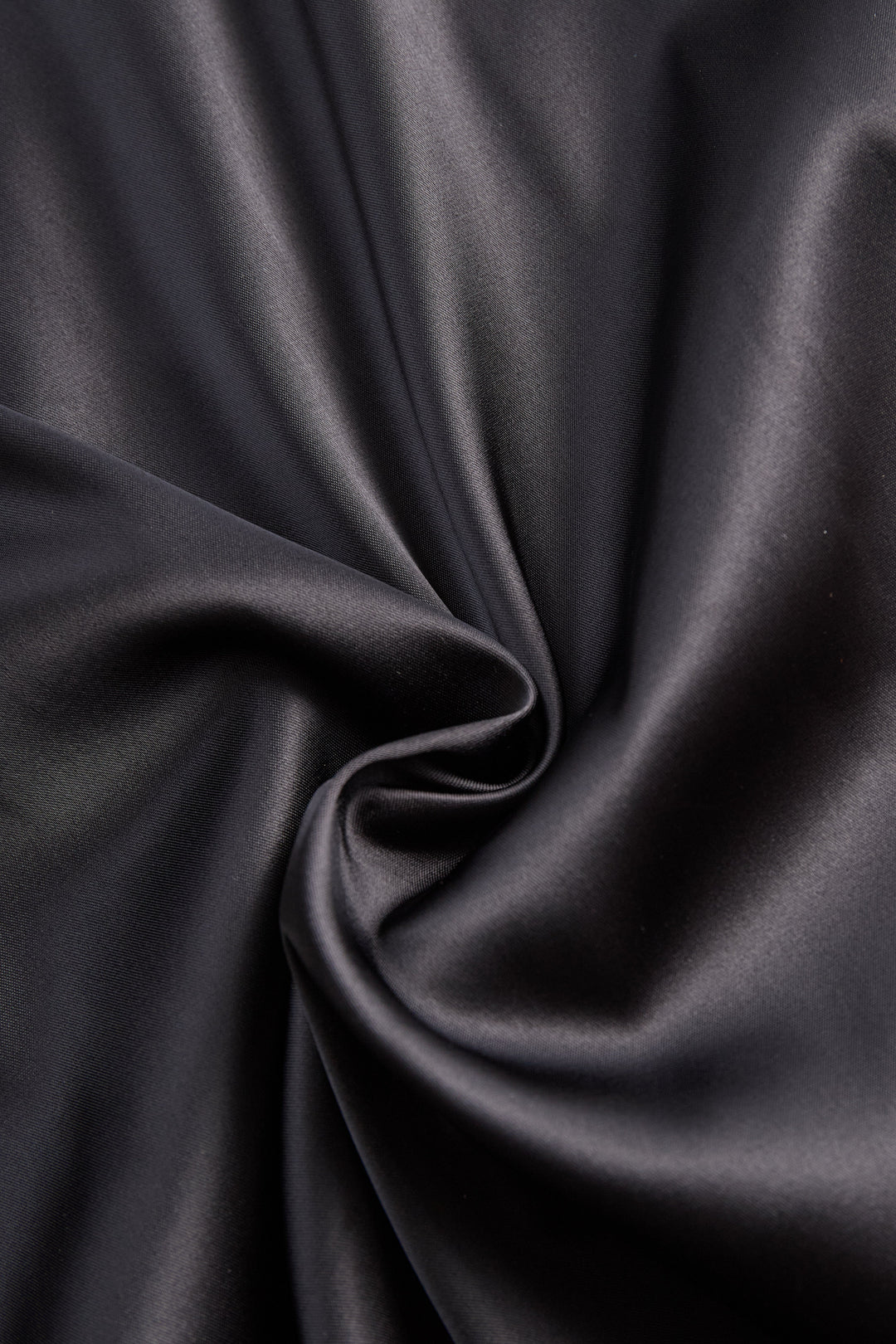 Women's elegant one-shoulder black maxi gown dress. Sophisticated sleeveless formal evening wear with a slit.