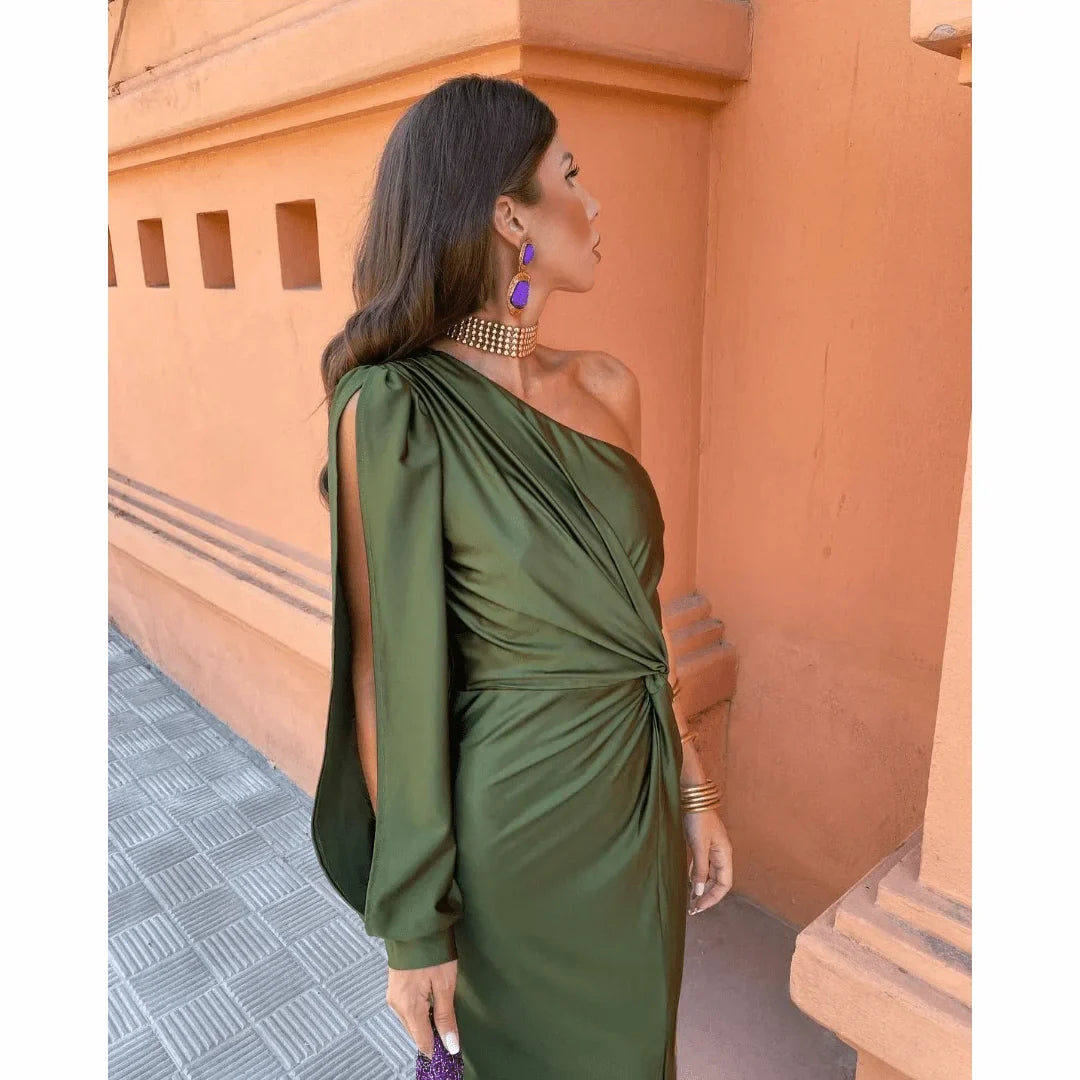 Stylish women's special occasion one-shoulder long evening dress with an elegant twisted front detail and side slit.