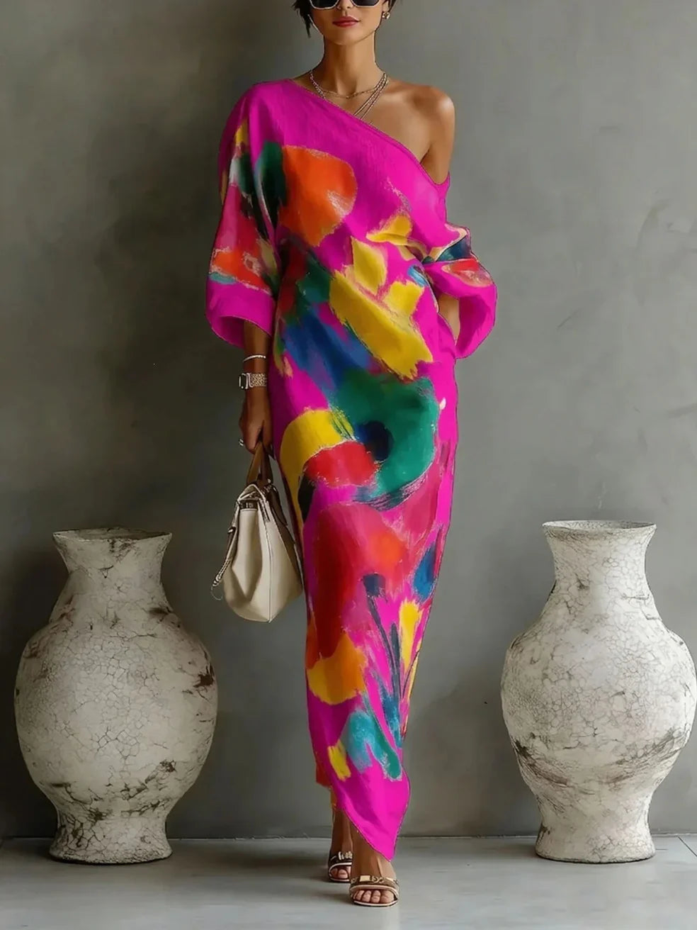 Sophisticated women's abstract print maxi dress, designed with an elegant one-shoulder neckline for special occasions.