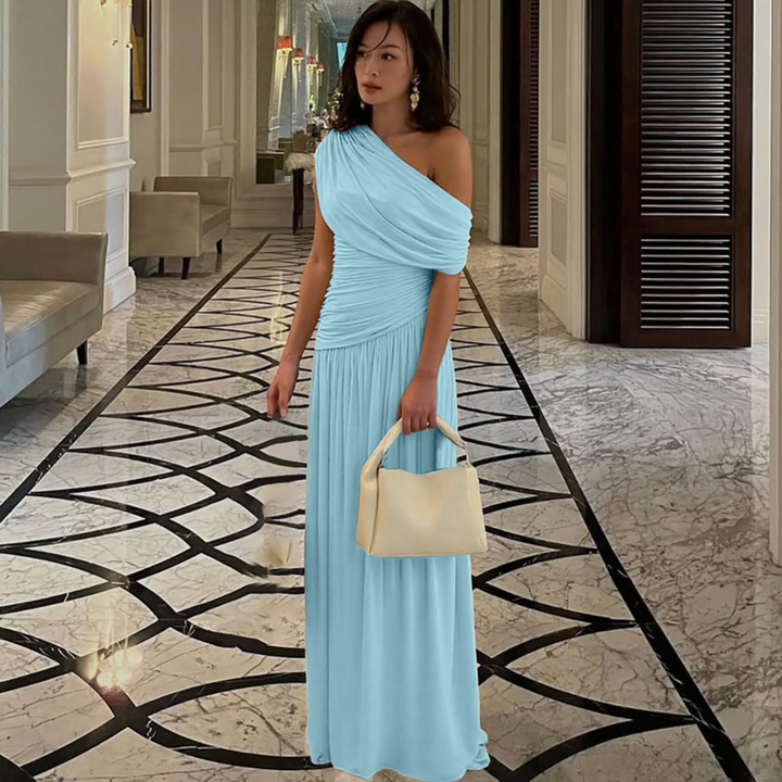 Flowing one-shoulder evening maxi dress for women, an elegant choice for special occasions & cocktail parties.