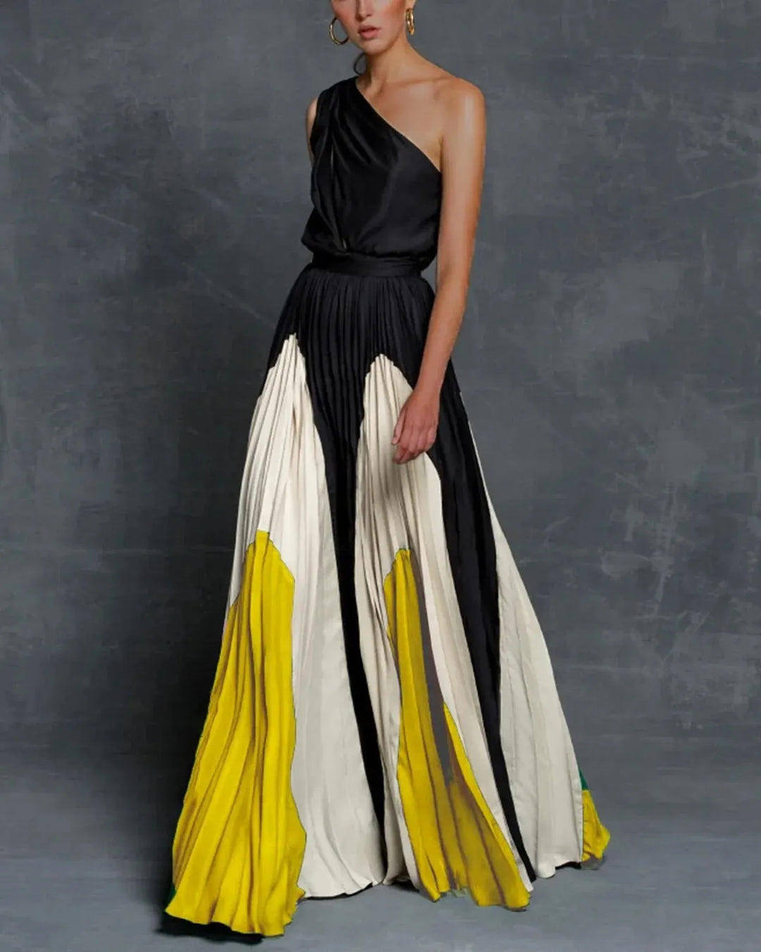 Elegant women's one-shoulder pleated maxi dress, perfect as a wedding guest or formal evening gown.