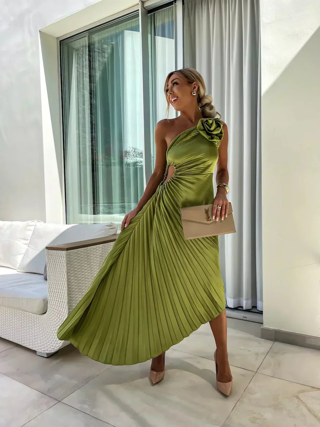 Chic one shoulder pleated maxi dress with floral detail, ideal for wedding guests & formal events.