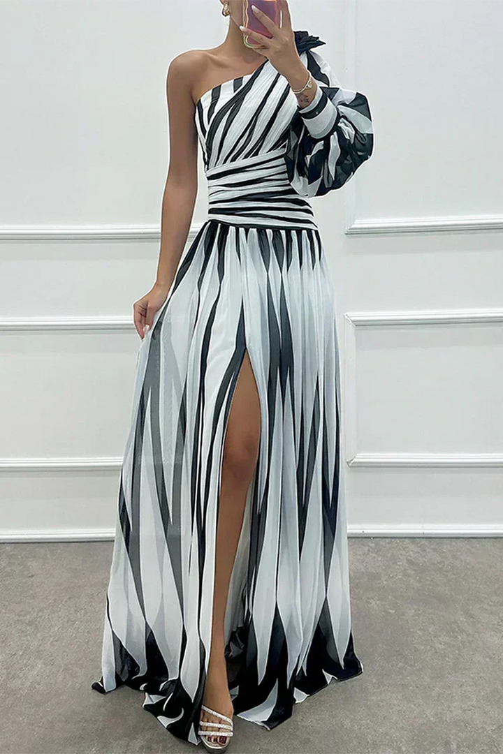 Chic one-shoulder striped maxi dress. Women's long formal gown, a statement piece for galas & evening events.