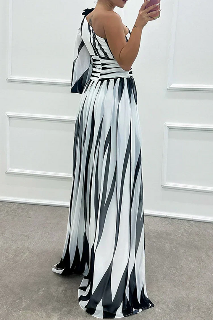 Sophisticated women's striped one-shoulder maxi dress. A stunning wedding guest dress & elegant party attire.
