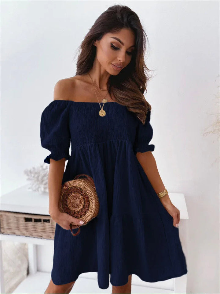 Feel elegant in this women's one-shoulder summer mini dress. A-line silhouette for party & vacation casual.