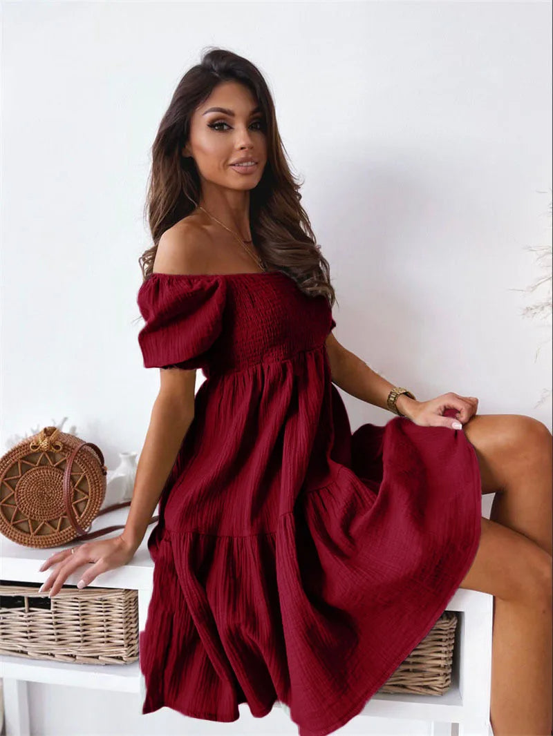 Versatile women's one-shoulder mini dress. Elegant summer wear, suitable for party, vacation or casual chic.