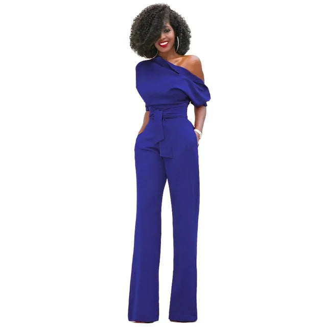 Sophisticated women's one-shoulder jumpsuit with a stylish belt & wide legs, ideal for elegant evening fashion.
