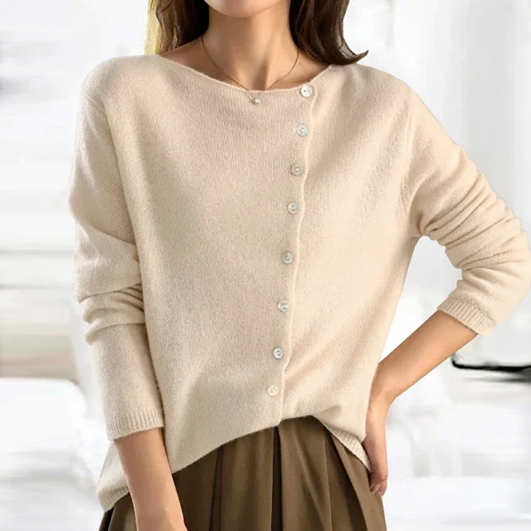 Chic women's asymmetrical long sleeve cardigan. Comfortable one-size sweater, ideal for unique fall fashion.