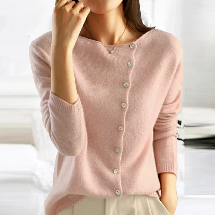 Versatile women's long sleeve cardigan. Cozy, one-size fit for elegant layering. Essential fall/winter outerwear.