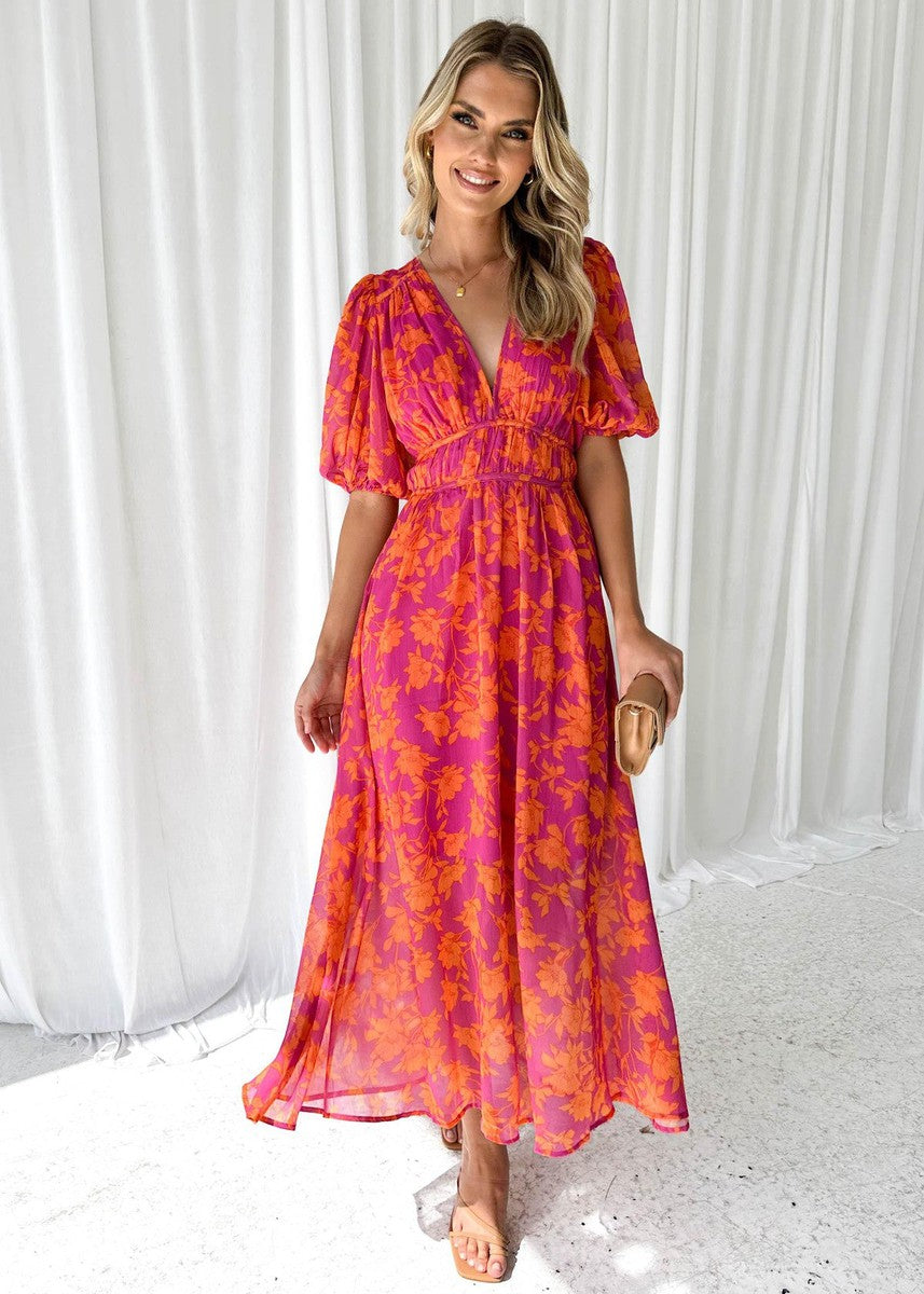 Elegant women's orange floral V-neck maxi dress, perfect for summer weddings & garden parties.
