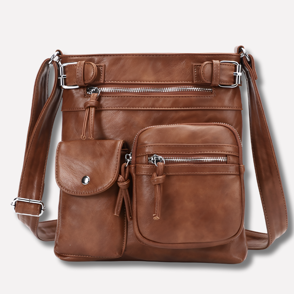 Elegant women's organized multi-pocket leather shoulder bag for everyday use.