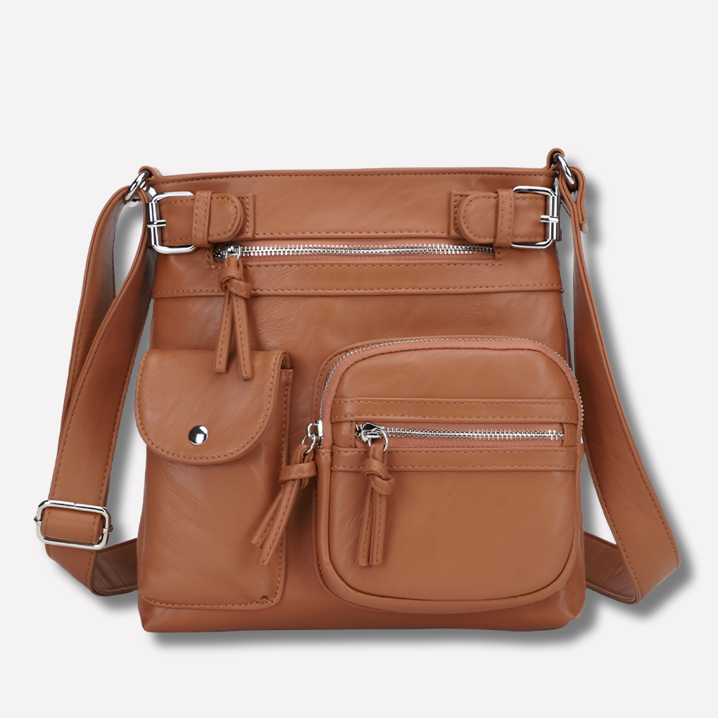 Stylish ladies' leather shoulder bag with multiple pockets, perfect for organization & fashion.