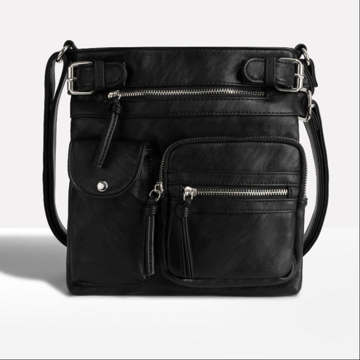 Chic ladies' leather multi-pocket shoulder bag, ideal for keeping your essentials organized & stylish.