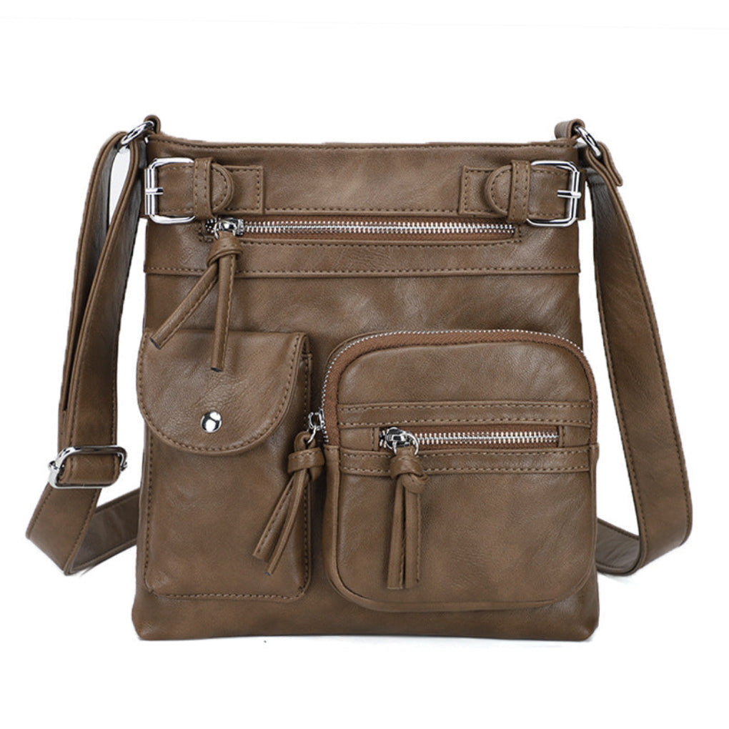 Fashionable women's leather handbag: organized, multi-pocket shoulder bag for elegant everyday carry.