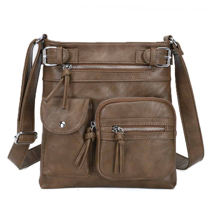 Fashionable women's leather handbag: organized, multi-pocket shoulder bag for elegant everyday carry.
