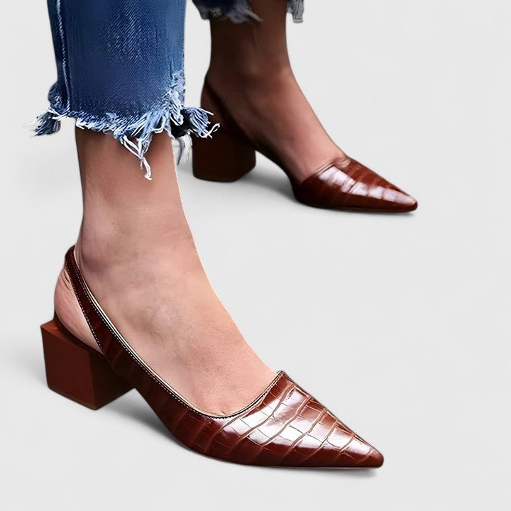 Stylish black orthopaedic heels for women, offering comfortable support. Perfect elegant footwear for work & formal wear.