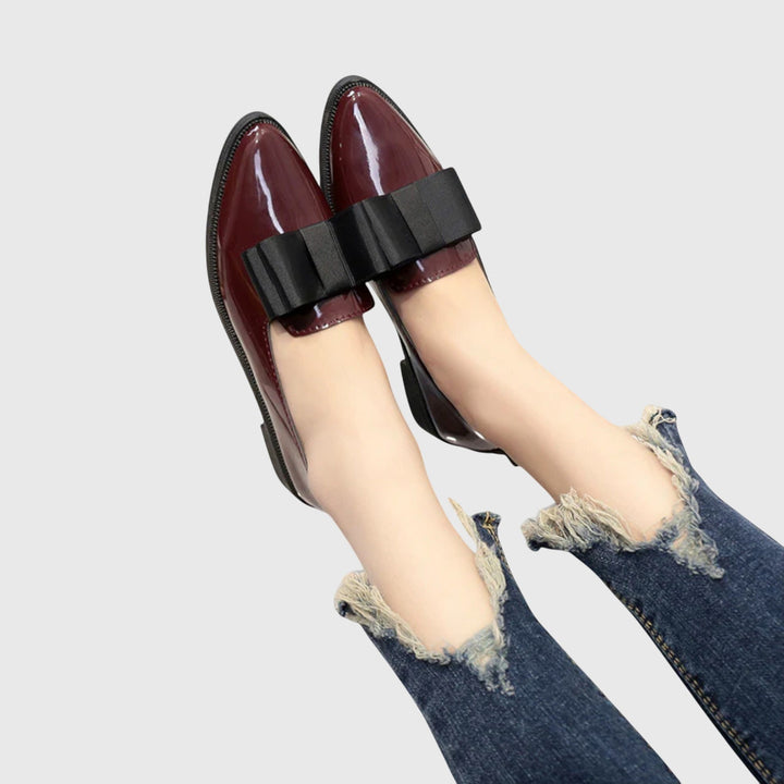 Classic black women's orthopaedic loafers. Elegant slip-on flats designed for ultimate comfort and daily wear.