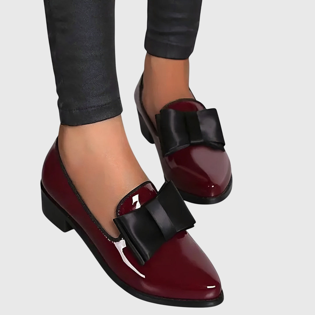 Modern women's orthopaedic loafers; elegant slip-on shoes with advanced comfort features for active lifestyles.
