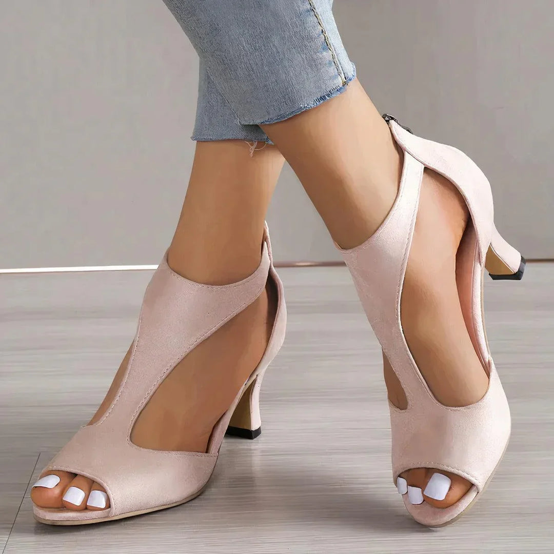 Elegant women's orthopedic sandals with arch support, comfortable for daily wear, perfect for summer chic.