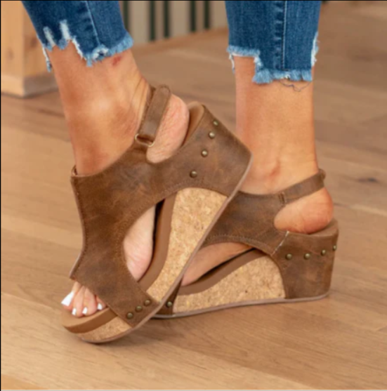 Comfortable orthopedic wedge sandals for women, featuring a peep toe and elegant design, ideal for all-day summer support.