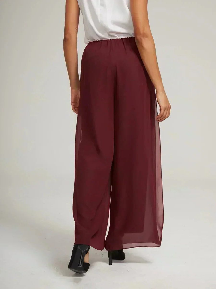 Elegant women's flowy wide leg pants, featuring a unique overlay design for ultimate style.