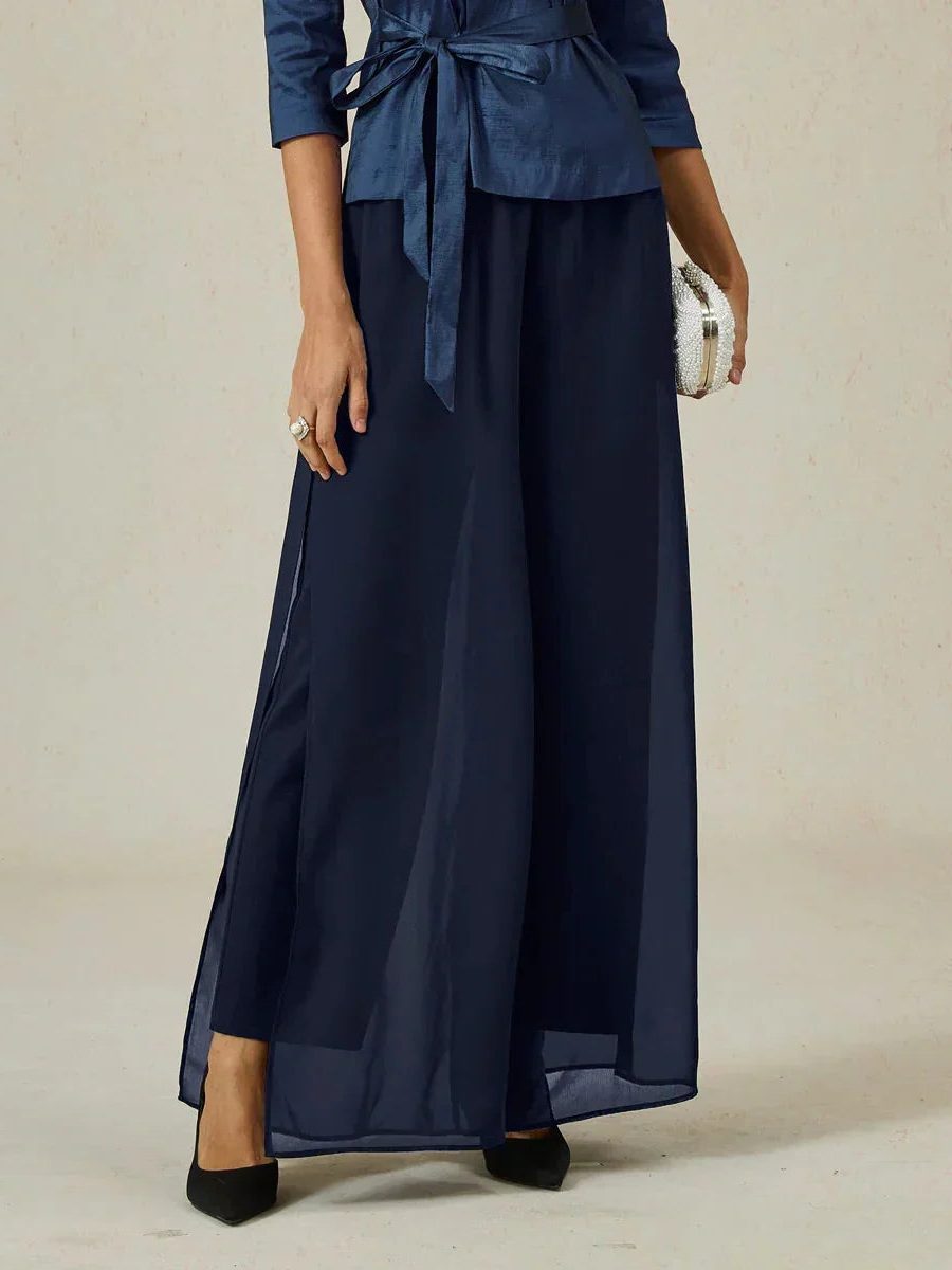 Stylish women's wide leg pants with a unique overlay and tie waist, perfect for chic outfits.