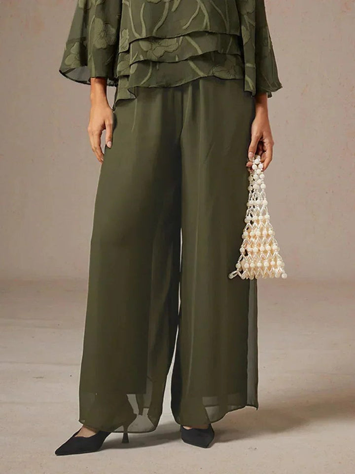 Flowy women's elegant wide leg pants, featuring a unique overlay design for a graceful silhouette.